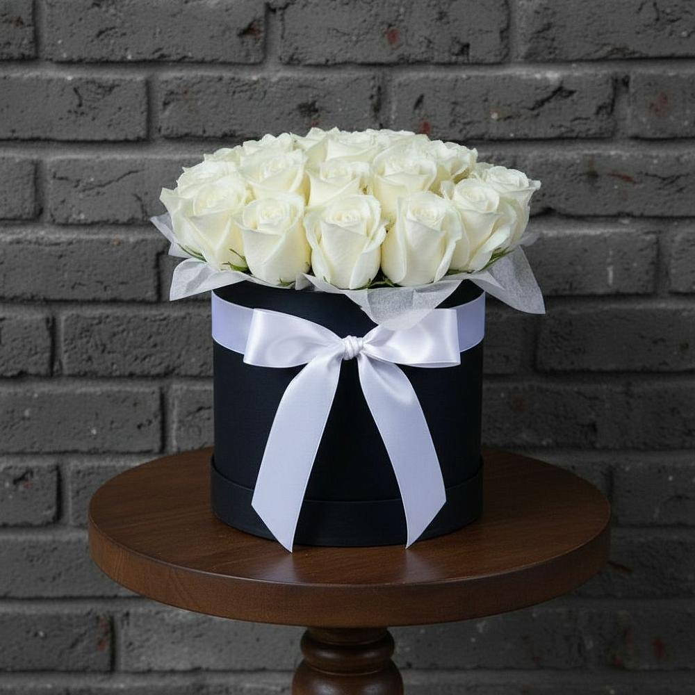 Цветочная композиция из Розы в шляпной коробке в Минусинске